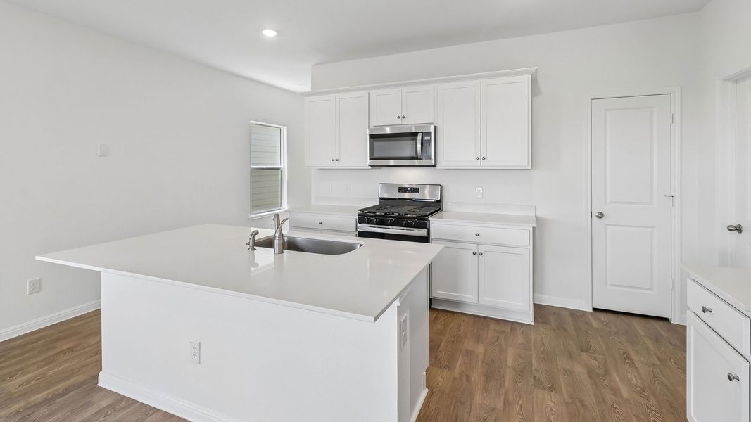 Furnished interior view inside a new home in Southgrove, Kyle (Image 9).