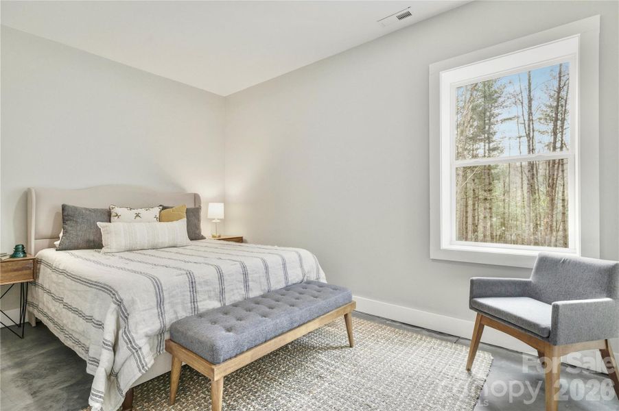 Furnished interior view inside a new home in , Lenoir (Image 9).
