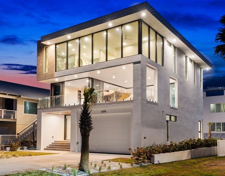 Front exterior of a new home in , New Smyrna Beach, FL, highlighting curb appeal (Image 33).