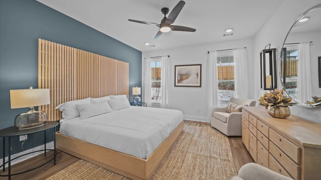 Memorable mornings begin in this tasteful and thoughtfully crafted main level primary suite