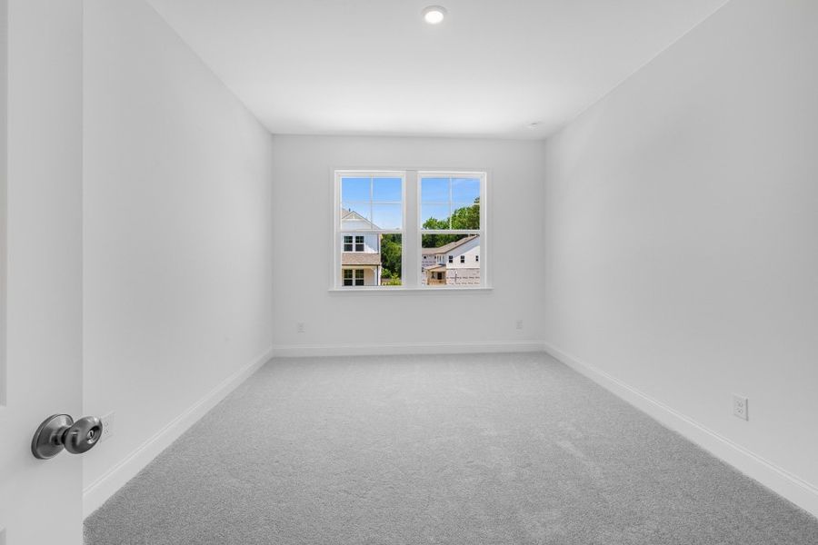 Representative unfurnished interior of a home built from the Trenton by Taylor Morrison in Bennett Farm, Loganville (Image 24).