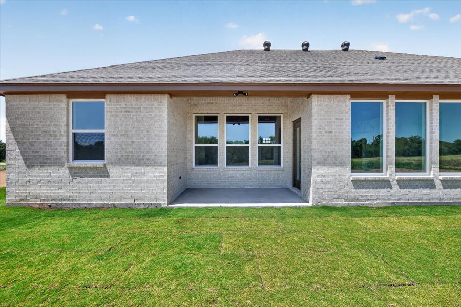 Front exterior of a new home in Taylor Ranch, Springtown, TX, highlighting curb appeal (Image 23).