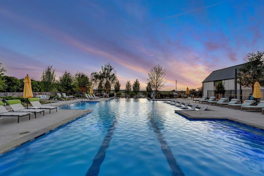 Community pool with a patio Community pool with a patio