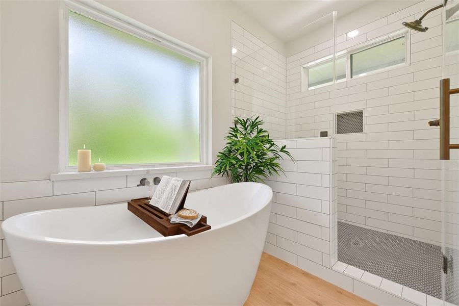 Relax in the soaking tub or take a long shower in the separate shower with built-in bench!