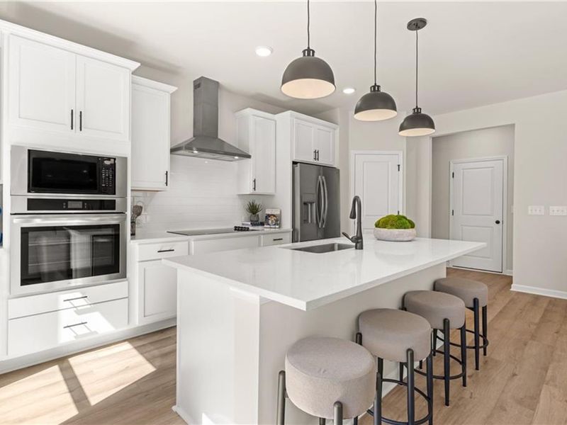 Furnished interior view inside a new home in The Bluffs, Canton (Image 4).