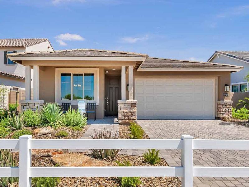 Front exterior of a new home in Icon at Thunderbird, Glendale, AZ, highlighting curb appeal (Image 1). Front exterior of a new home in Icon at Thunderbird, Glendale, AZ, highlighting curb appeal (Image 1).