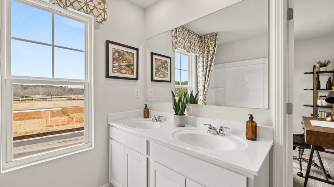 Representative furnished interior of a home built from the Stratford by D.R. Horton in Echo Glen, Stockbridge (Image 29).