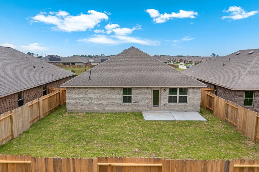 Front exterior of a new home in Bayou Maison, Dickinson, TX, highlighting curb appeal (Image 18).
