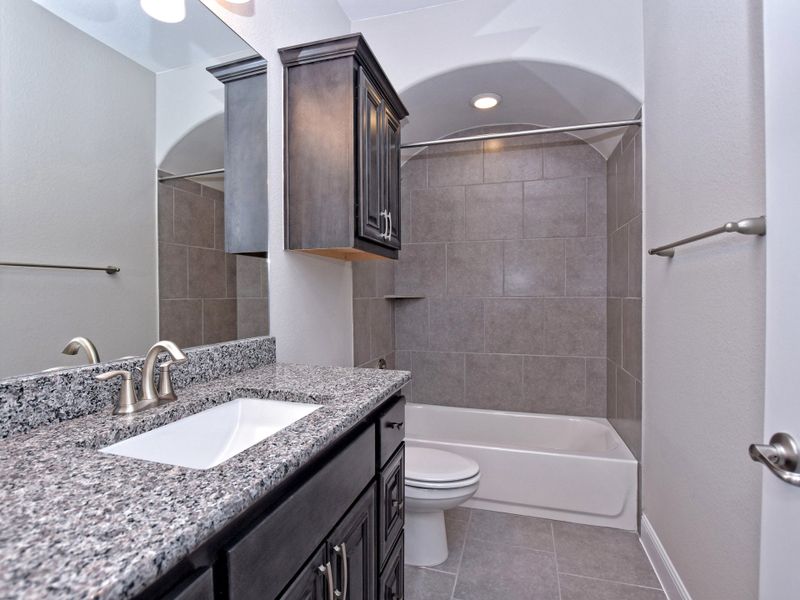 Representative furnished interior of a home built from the San Simeon II by Giddens Homes in Clearwater Ranch, Liberty Hill (Image 20).