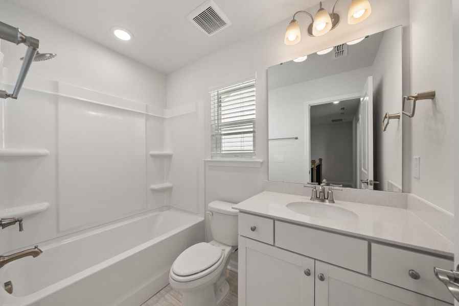 Furnished interior view inside a new home in Huxley, Apex (Image 10).