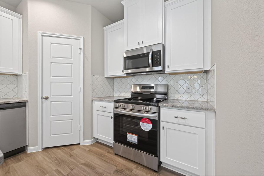 Furnished interior view inside a new home in Woodland Lakes, Houston (Image 11).