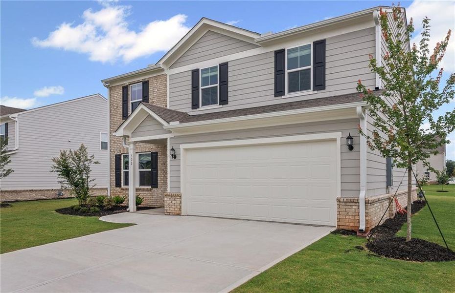 Front exterior of a new home in Anderson Point, McDonough, GA, highlighting curb appeal (Image 20). Front exterior of a new home in Anderson Point, McDonough, GA, highlighting curb appeal (Image 20).