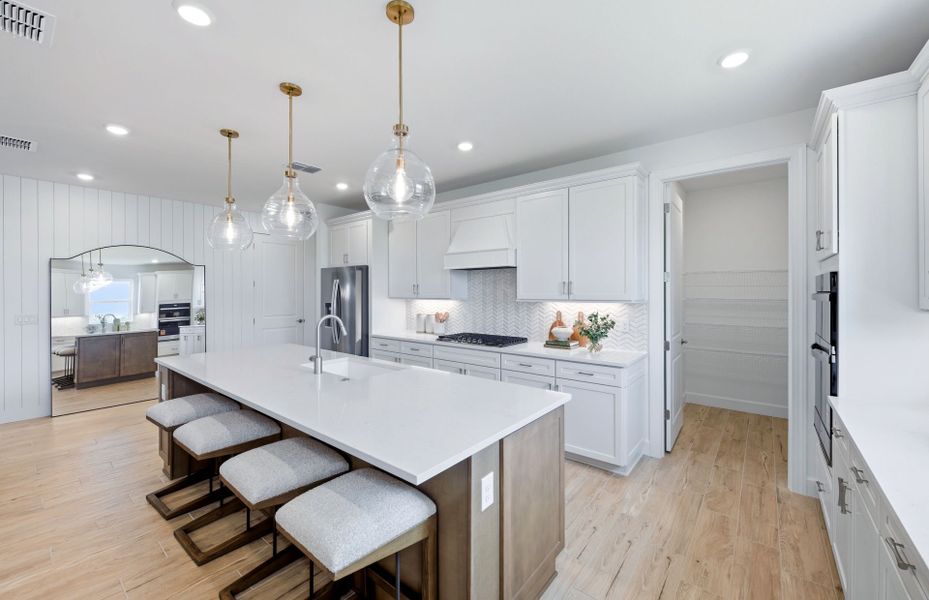 Representative furnished interior of a home built from the Palmary by DiVosta in BeachWalk by Manasota Key, Englewood (Image 10).