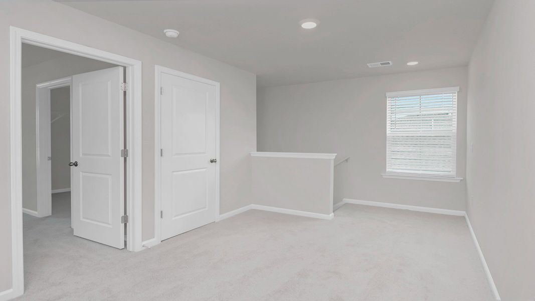Representative unfurnished interior of a home built from the ROBIE by D.R. Horton in Ferry Grove, Lexington (Image 27).