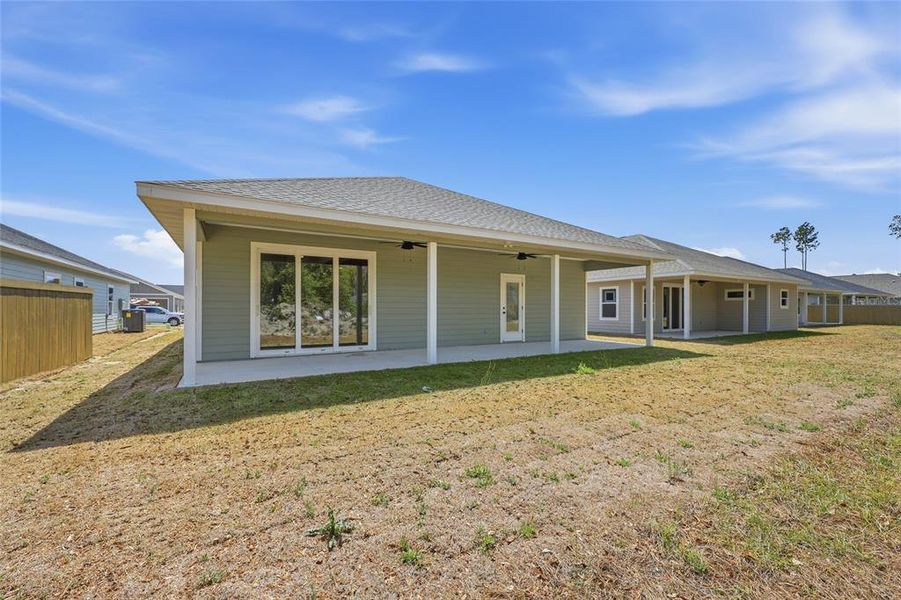 Exterior details and patio area of a home in Grand Oaks, Gainesville (Image 22).