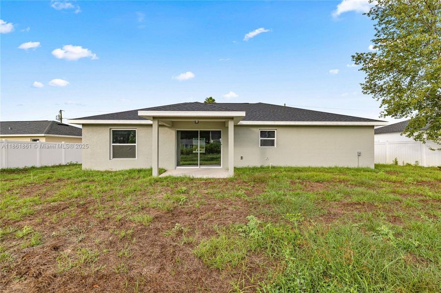 Exterior details and patio area of a home in , Ocala (Image 22).