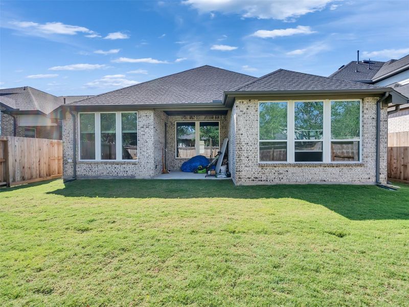 Exterior details and patio area of a home in Tompkins Reserve, Katy (Image 4).
