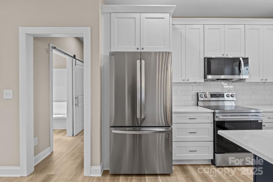 Furnished interior view inside a new home in , Olin (Image 12). Furnished interior view inside a new home in , Olin (Image 12).