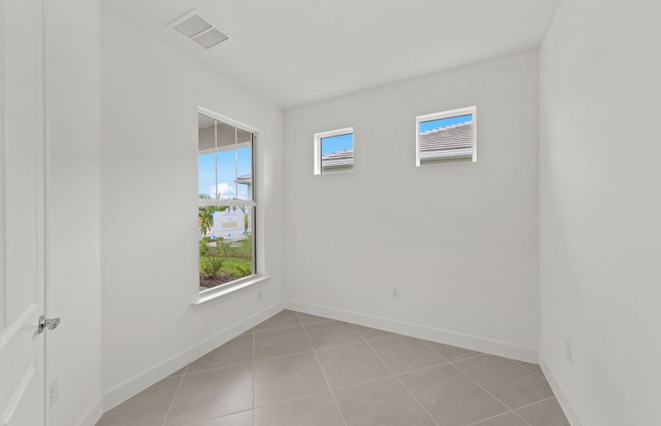 Enclosed flex room featuring elegant French doors Enclosed flex room featuring elegant French doors