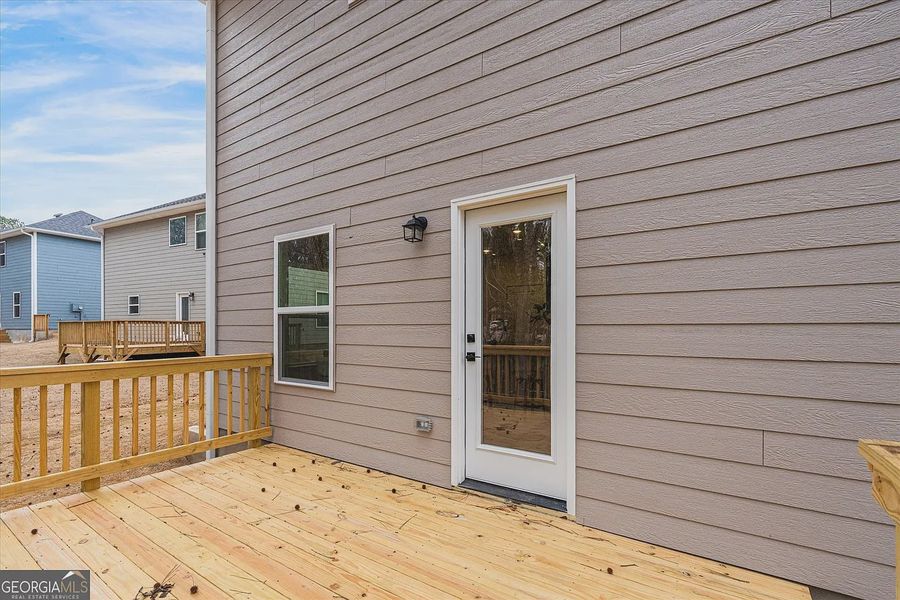 Exterior details and patio area of a home in Canterbury Villas, Carrollton (Image 25).