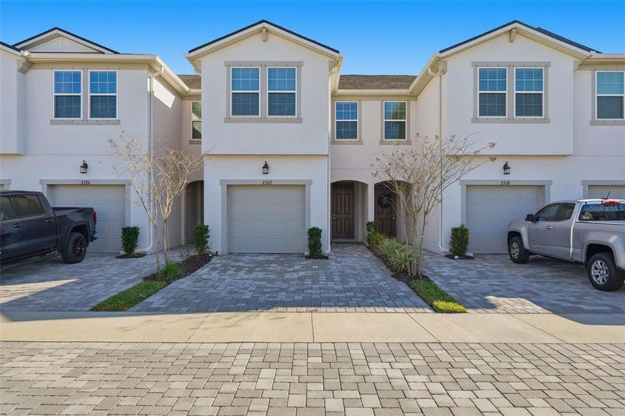 Front exterior of a new home in , Lutz, FL, highlighting curb appeal (Image 24).