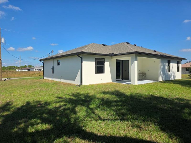 Exterior details and patio area of a home in , North Port (Image 37).