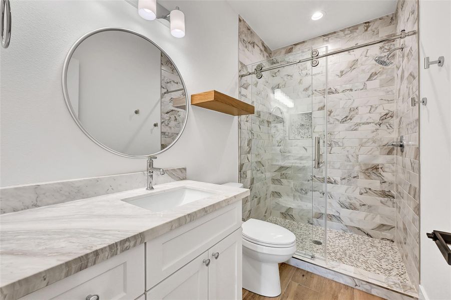 Bedroom Three ensuite with custom tile and counter tops