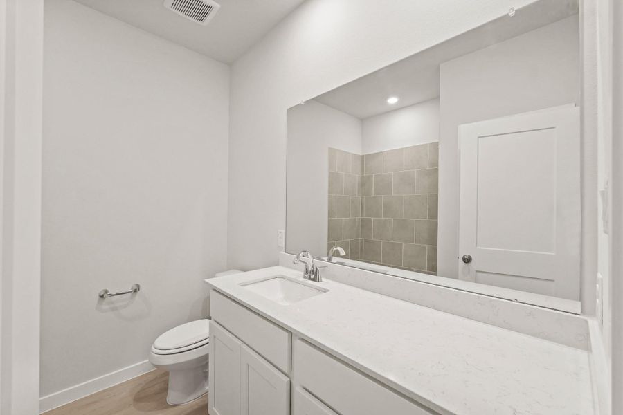 Furnished interior view inside a new home in Caney Mills, Conroe (Image 8).