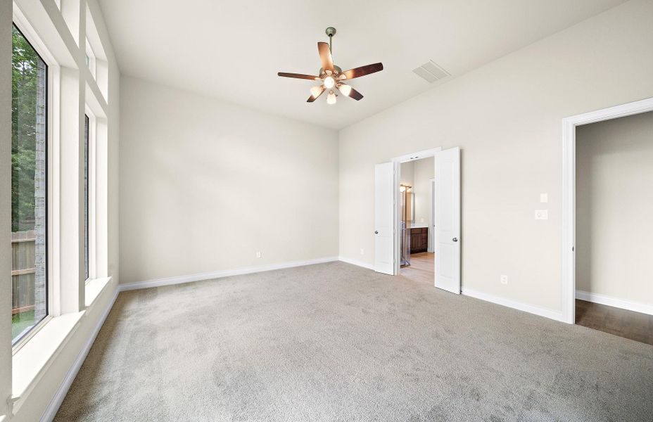 Spacious, unfurnished interior of a new home in The Woodlands Hills 65′, Willis (Image 23).