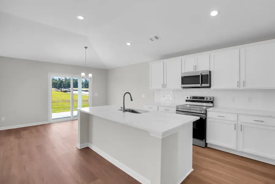 Representative furnished interior of a home built from the The Aspen by Smith Family Homes in Sweetwater, Brunswick (Image 4).