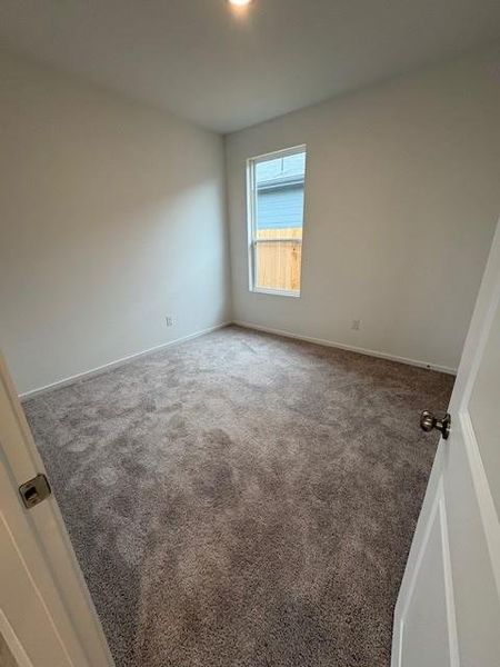 Secondary bedroom. There is only carpet in the bedrooms. Secondary bedroom. There is only carpet in the bedrooms.