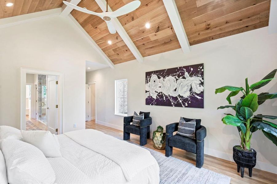 Bedroom featuring multiple windows, wood ceiling, and ceiling fan