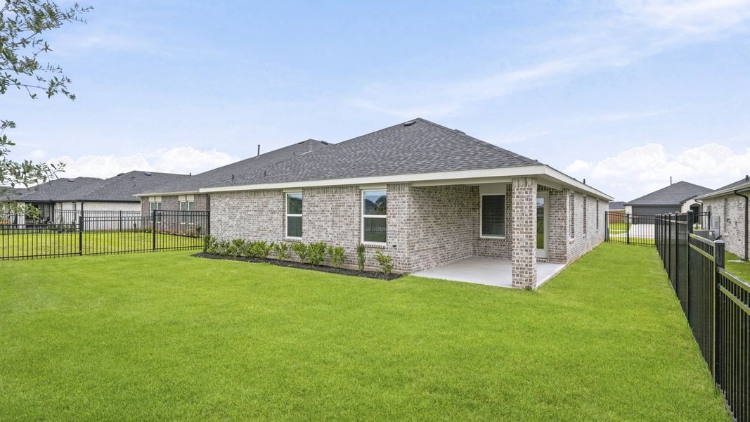 Exterior details and patio area of a home in Sunterra, Katy (Image 4).