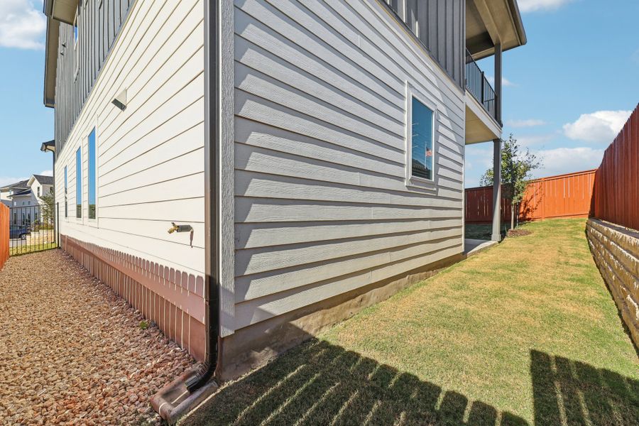 Exterior details and patio area of a home in Foxfield, Austin (Image 24).