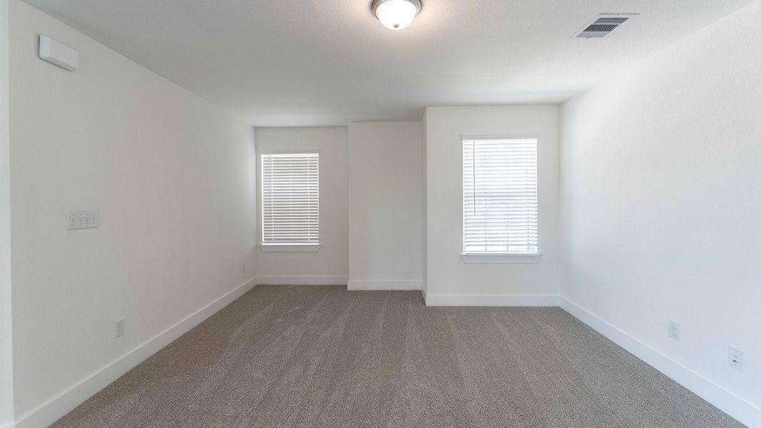 Spacious, unfurnished interior of a new home in Massey Oaks, Pearland (Image 42).