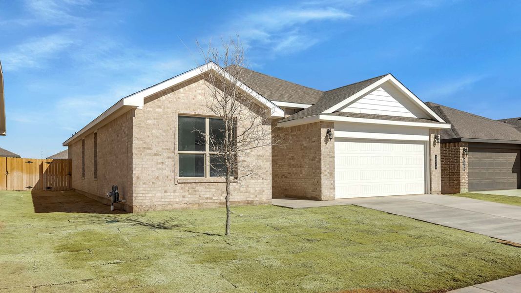 Front exterior of a new home in Allen Farms, Lubbock, TX, highlighting curb appeal (Image 15).