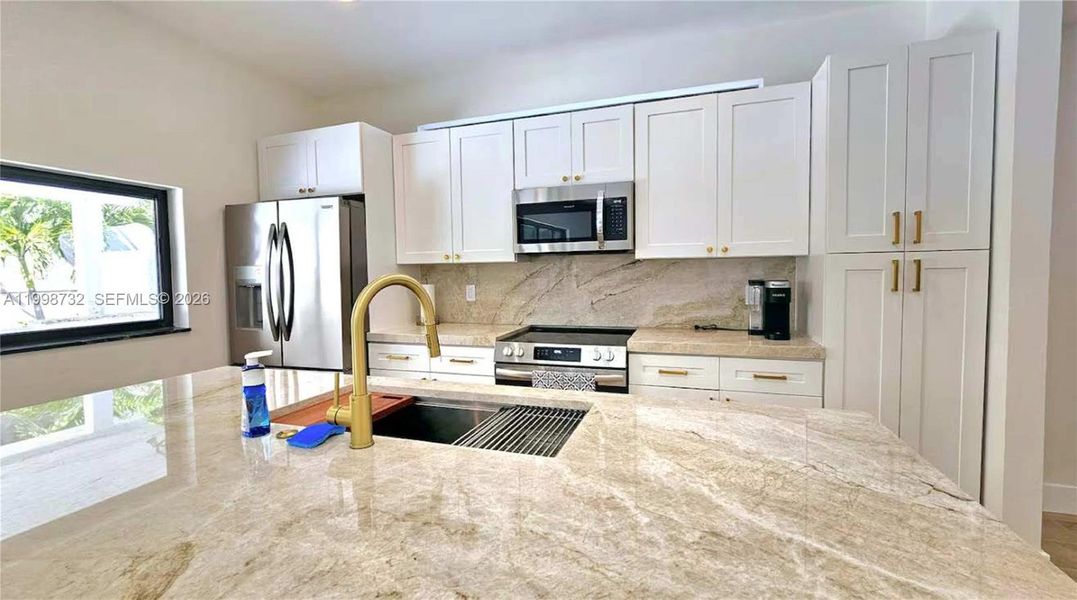 Furnished interior view inside a new home in , Boynton Beach (Image 6).