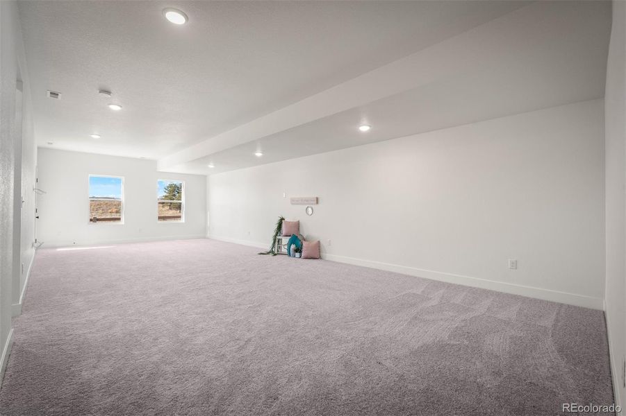 Spacious, unfurnished interior of a new home in Revel Crossing at Wolf Ranch - The Panorama Collection, Colorado Springs (Image 21).