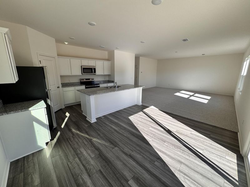 Furnished interior view inside a new home in Pender Woods at Cane Bay, Summerville (Image 3).