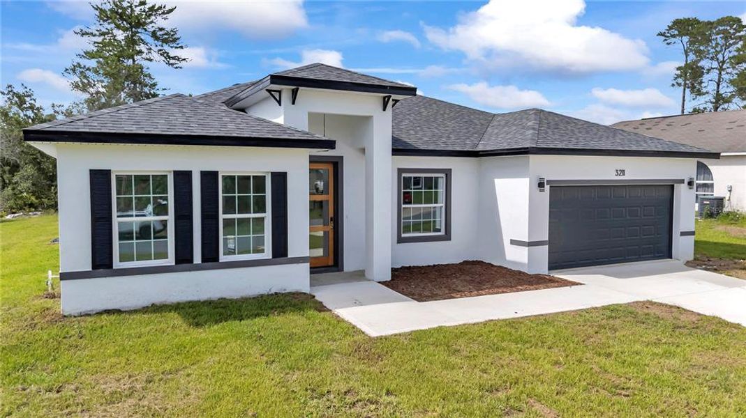 Front exterior of a new home in , Ocala, FL, highlighting curb appeal (Image 22).
