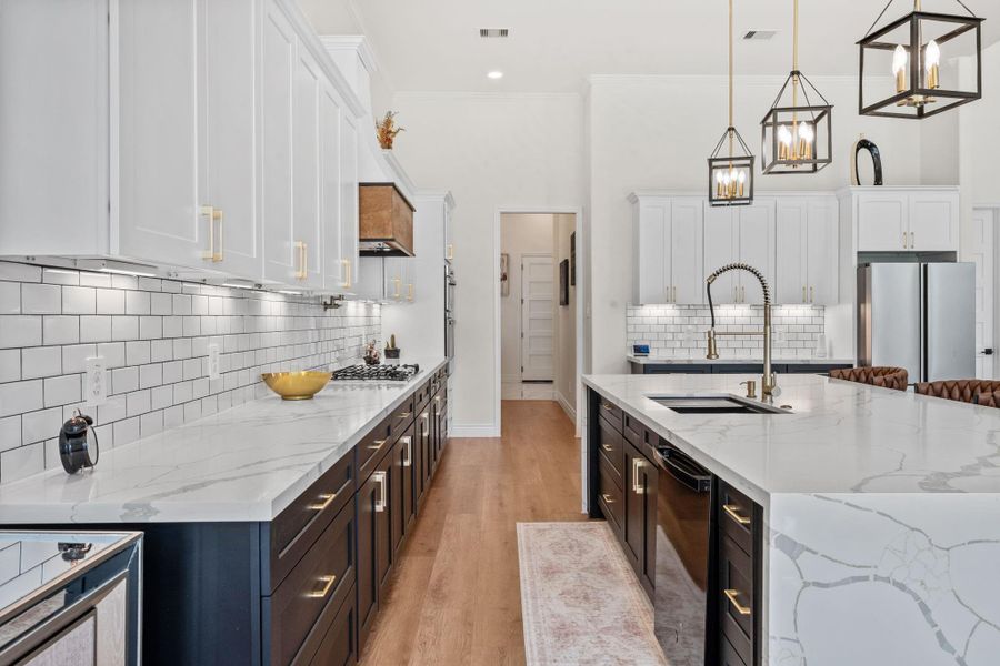 Beautiful kitchen countertops and plenty of storage space.