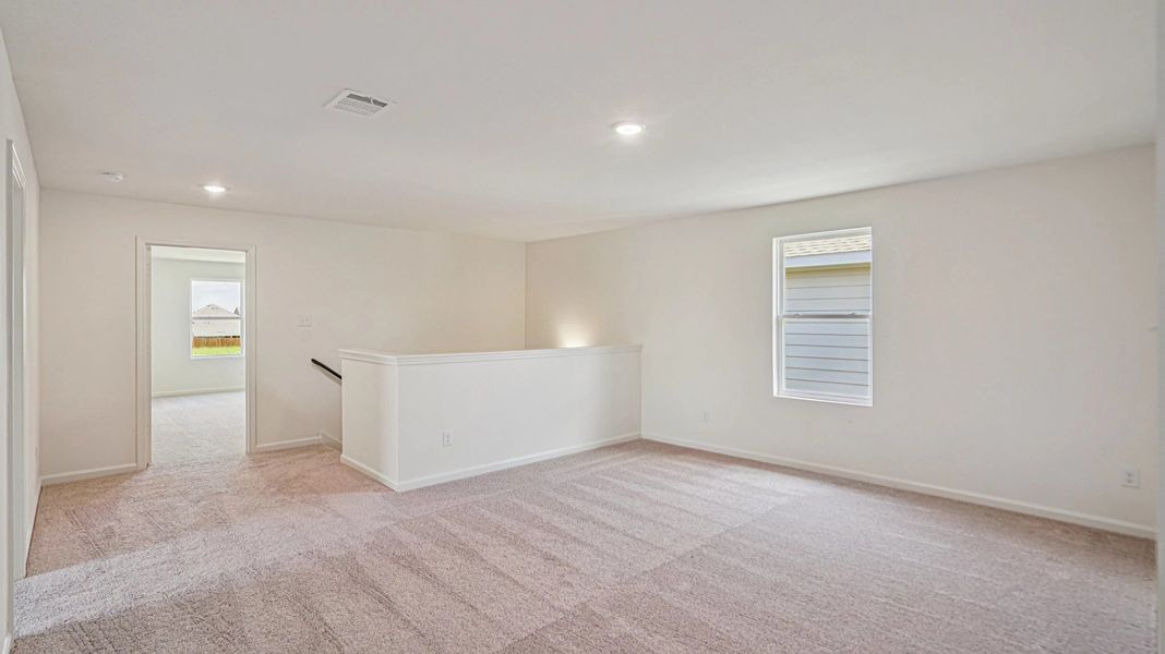 Representative unfurnished interior of a home built from the Pioneer by Starlight Homes in Avalon Ridge, Cut and Shoot (Image 20).