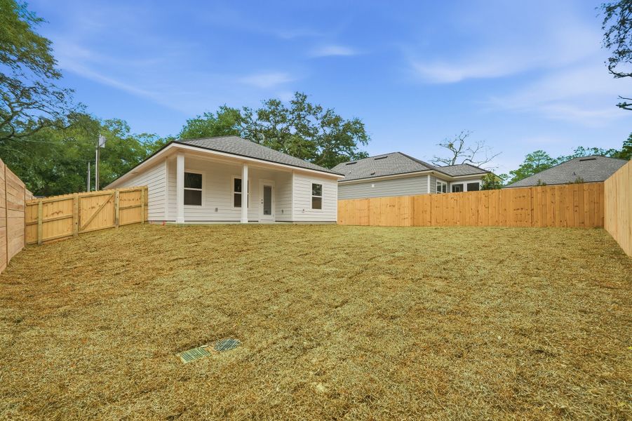 Exterior details and patio area of a home in Live Oak Cottages, Freeport (Image 26). Exterior details and patio area of a home in Live Oak Cottages, Freeport (Image 26).