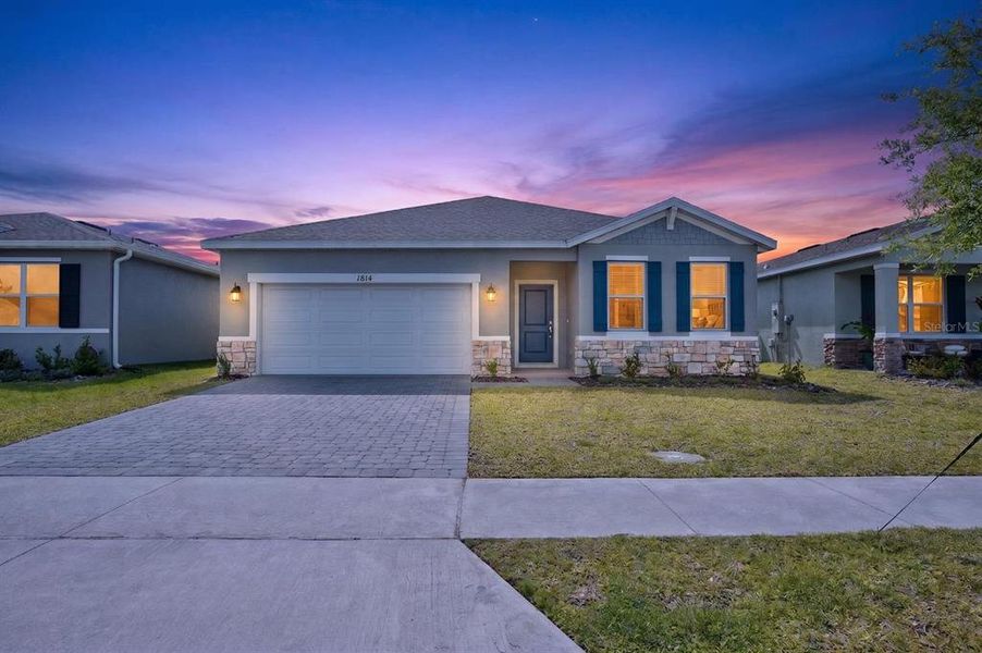 Front exterior of a new home in , St. Cloud, FL, highlighting curb appeal (Image 20).