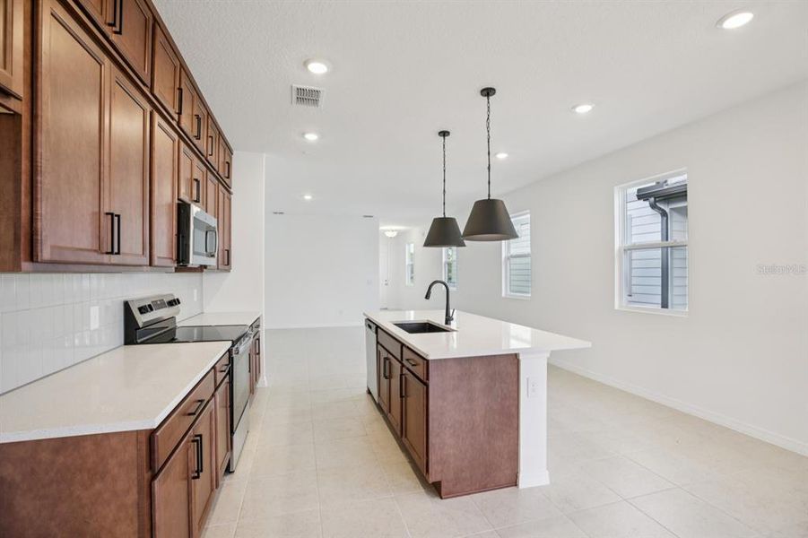 Furnished interior view inside a new home in , Winter Garden (Image 6).
