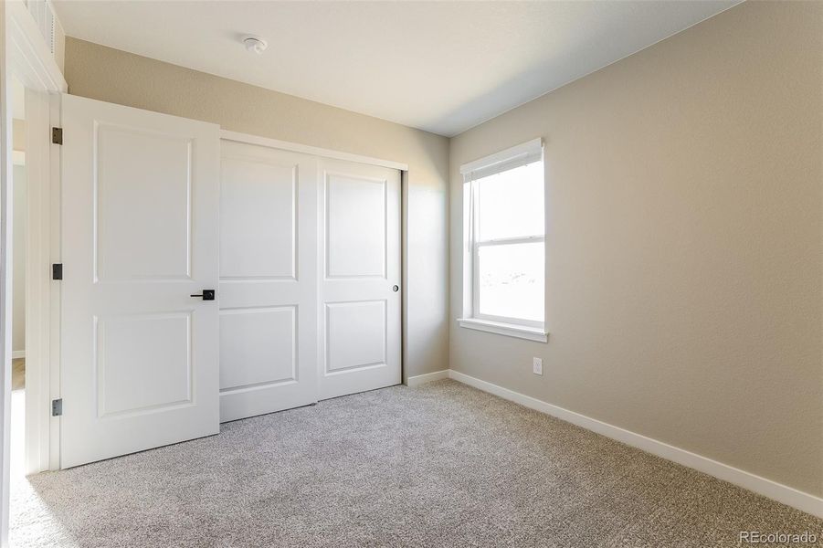 Spacious, unfurnished interior of a new home in Second Creek Farm, Commerce City (Image 14).