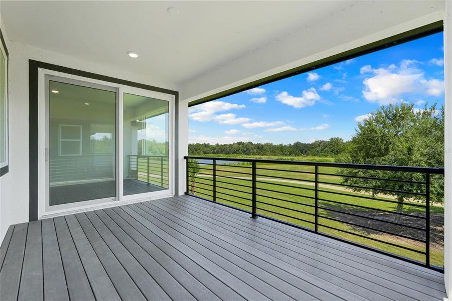 Exterior details and patio area of a home in Hampton Green at Providence, Davenport (Image 29).