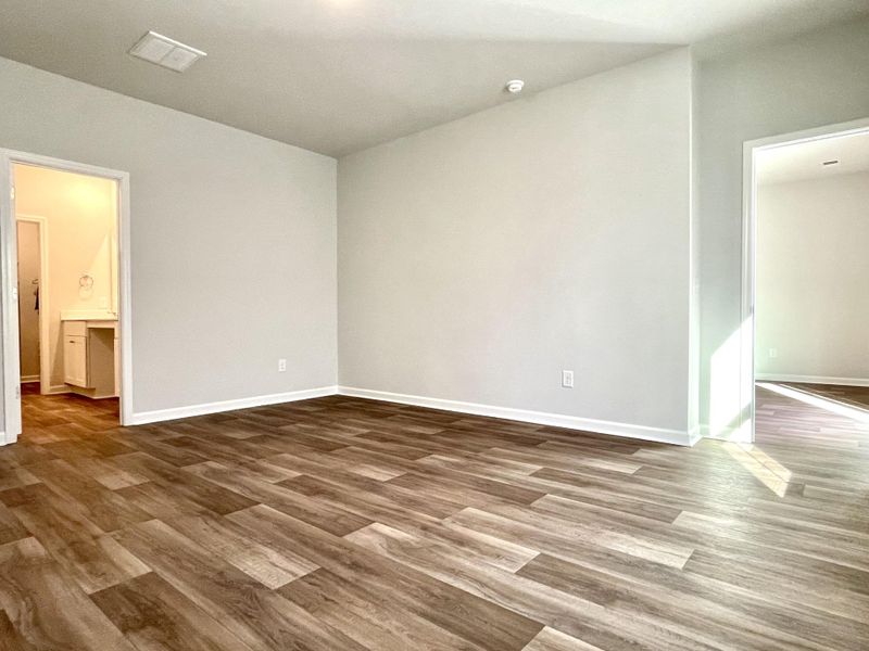 Spacious, unfurnished interior of a new home in Lindera Preserve at Cane Bay Plantation, Summerville (Image 25). Spacious, unfurnished interior of a new home in Lindera Preserve at Cane Bay Plantation, Summerville (Image 25).