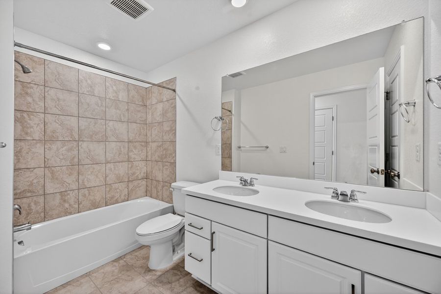 Furnished interior view inside a new home in Trailstone, Arvada (Image 7).