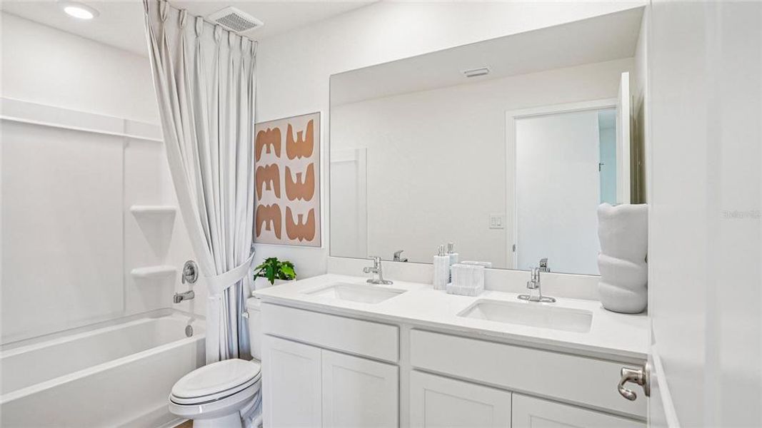 Furnished interior view inside a new home in Twisted Oaks, Wildwood (Image 26).